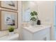 Bright bathroom features a modern vanity, neutral countertops, and stylish decor for a fresh, inviting feel at 2080 Ashwood Bluff Dr, Ocoee, FL 34761