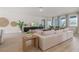 Bright and airy living room with modern decor, natural light, and stylish furnishings at 2080 Ashwood Bluff Dr, Ocoee, FL 34761