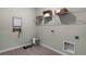 Functional laundry room with ample storage and modern fixtures at 2092 Ashwood Bluff Dr, Ocoee, FL 34761