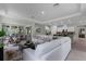 Spacious open-concept living room with a seamless layout to the dining and kitchen areas at 2092 Ashwood Bluff Dr, Ocoee, FL 34761