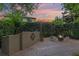 Inviting brick patio showcasing an outdoor bar area, fire pit and charming twilight sky at 2238 Hawick Ln # 2238, Winter Park, FL 32792