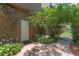 Backyard brick paved path with a garden leading to the home's side entrance at 2238 Hawick Ln # 2238, Winter Park, FL 32792