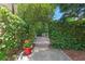 Backyard with brick pavers and lush landscaping at 2238 Hawick Ln # 2238, Winter Park, FL 32792