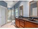 Bathroom with double sink, walk-in shower, and tiled floors at 2238 Hawick Ln # 2238, Winter Park, FL 32792