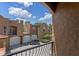 View of the property's exterior showing garages, balconies and stucco architecture at 2238 Hawick Ln # 2238, Winter Park, FL 32792