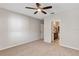 Comfortable bedroom with access to an en-suite bathroom at 2426 Addison Creek Dr, Kissimmee, FL 34758