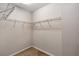Walk-in closet featuring neutral paint color and wire shelving at 2426 Addison Creek Dr, Kissimmee, FL 34758