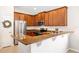 Well-equipped kitchen with granite countertops and stainless steel appliances at 2426 Addison Creek Dr, Kissimmee, FL 34758
