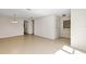 Open-concept living room with tile flooring and neutral paint scheme at 2426 Addison Creek Dr, Kissimmee, FL 34758