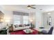 Comfortable living room with natural light and modern decor, perfect for relaxation and entertainment at 2441 Spring Tune Aly, Kissimmee, FL 34744