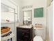 Bathroom featuring a vanity with storage, a toilet, and shower with curtain at 2504 Caribbean Ct, Orlando, FL 32805