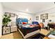 Bedroom features neutral walls, a large window, carpeted floors, and fun decor at 2504 Caribbean Ct, Orlando, FL 32805