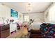 Bright bedroom with a cozy chandelier and ample natural light at 2504 Caribbean Ct, Orlando, FL 32805
