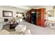 Bright living room boasting hardwood floors, white couches, and a decorative entertainment center at 2504 Caribbean Ct, Orlando, FL 32805
