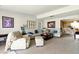 Spacious living room featuring a sectional sofa, comfortable armchair and tasteful decor at 2504 Caribbean Ct, Orlando, FL 32805