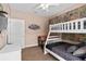 Fun bedroom featuring a bunk bed and a foosball table, perfect for a kid or guest room at 2952 Lucayan Harbour Cir # 105, Kissimmee, FL 34746