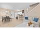 Open-concept living area with cozy seating and direct access to the kitchen and dining space at 2952 Lucayan Harbour Cir # 105, Kissimmee, FL 34746