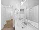 Bright bathroom featuring a double sink vanity and a large mirror at 3561 Conroy Rd # 216, Orlando, FL 32839