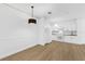 Spacious open floor plan combining dining area and kitchen with modern design at 3561 Conroy Rd # 216, Orlando, FL 32839