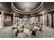 Private theater featuring tiered seating, a large screen, and stylish decor at 3561 Conroy Rd # 216, Orlando, FL 32839