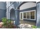 Cozy covered patio with tiled floor, perfect for outdoor seating and relaxation at 3561 Conroy Rd # 216, Orlando, FL 32839