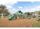 Community playground with slides and climbing structures for children at 3561 Conroy Rd # 216, Orlando, FL 32839
