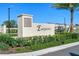 Elegant community entrance sign for Eastgrove, set against a backdrop of lush landscaping and blue sky at 3624 Sungrove Cir, Sanford, FL 32771