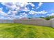Fully fenced backyard offering privacy and security with a lush green lawn at 3723 Alder Bark Ln, Sanford, FL 32773
