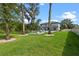 Large backyard featuring a beautiful pool, patio, and lush green lawn perfect for outdoor activities at 3865 W Stillwood Ln, Lake Mary, FL 32746