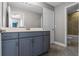 Bathroom featuring a granite vanity, cabinets, and access to the shower and toilet at 3865 W Stillwood Ln, Lake Mary, FL 32746
