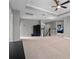 Spacious bonus room features stairs, a clock and view of other rooms at 3865 W Stillwood Ln, Lake Mary, FL 32746
