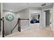 Hallway with a view into a main bedroom at 3865 W Stillwood Ln, Lake Mary, FL 32746