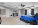 Spacious main bedroom with tray ceilings, carpet floors, and neutral paint at 3865 W Stillwood Ln, Lake Mary, FL 32746