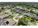 Aerial view of quiet residential neighborhood showcasing landscaped lawns and various home styles at 445 Oakland Park Blvd, Port Orange, FL 32127