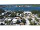 Aerial view of the coastal home, showcasing proximity to the bay and surrounding neighborhood at 507 N Peninsula Ave, New Smyrna Beach, FL 32169