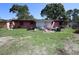 Backyard of a house with a pile of garbage at 5262 Lescot Ln, Orlando, FL 32811