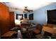 Messy bedroom needing repair with ceiling fan and blue walls at 5262 Lescot Ln, Orlando, FL 32811