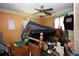 Bedroom in disarray with overturned mattress and personal items at 5262 Lescot Ln, Orlando, FL 32811