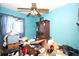Cluttered bedroom with blue walls and lots of personal items at 5262 Lescot Ln, Orlando, FL 32811
