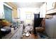 Dated kitchen with tile floor and appliances, needing renovations at 5262 Lescot Ln, Orlando, FL 32811