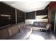 Enclosed patio featuring two sofas at 5262 Lescot Ln, Orlando, FL 32811