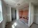 Bathroom featuring a walk-in closet and walk-in shower under construction showcases potential for customization at 710 Junonia Blvd, New Smyrna Beach, FL 32168