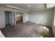 Expansive bedroom with neutral carpeting and ample space at 710 Junonia Blvd, New Smyrna Beach, FL 32168