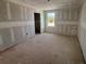 Bedroom featuring a window, awaiting personalization at 710 Junonia Blvd, New Smyrna Beach, FL 32168
