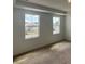 Bright bedroom with dual windows offering natural light at 710 Junonia Blvd, New Smyrna Beach, FL 32168