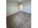 Neutral bedroom with a door leading to a closet or adjoining room at 710 Junonia Blvd, New Smyrna Beach, FL 32168
