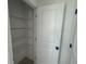 Linen closet featuring wire shelves at 710 Junonia Blvd, New Smyrna Beach, FL 32168