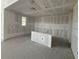 Unfinished kitchen area ready for appliances and finishes, with a space designed for a kitchen island at 710 Junonia Blvd, New Smyrna Beach, FL 32168