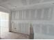 An expansive living room with an open floor plan, ready for customization at 710 Junonia Blvd, New Smyrna Beach, FL 32168