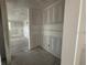 Bare corner of a room, drywall finish ready for paint at 710 Junonia Blvd, New Smyrna Beach, FL 32168